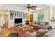 Living room with hardwood floors, built-in shelving and seating at 412 E Hudson Ave, Folly Beach, SC 29439