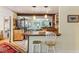 Kitchen with butcher block island and wooden cabinets at 412 E Hudson Ave, Folly Beach, SC 29439