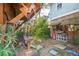 Rustic backyard with wooden structures and lush greenery at 412 E Hudson Ave, Folly Beach, SC 29439