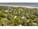 Aerial view of neighborhood near the beach with a water tower at 412 E Hudson Ave, Folly Beach, SC 29439