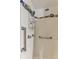 Clean shower with shower caddy and grab bar at 412 E Hudson Ave, Folly Beach, SC 29439