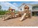 Wooden playset with slide and climbing features at 1687 Cultivation Ln # 461, Mount Pleasant, SC 29466
