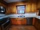 Updated kitchen with stainless steel appliances and wood cabinets at 2320 S Lander Ln, Charleston, SC 29414