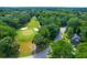 Aerial view of golf course and neighborhood at 10 Trail Hollow Dr, Charleston, SC 29414