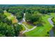 Golf course with roads and lush green landscape at 10 Trail Hollow Dr, Charleston, SC 29414
