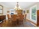 Formal dining room featuring hardwood floors, an oval table, and chandelier at 10 Trail Hollow Dr, Charleston, SC 29414