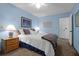 Light blue bedroom with a double bed and two night stands at 10 Trail Hollow Dr, Charleston, SC 29414