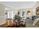 Living room with hardwood floors, sofas, and a view of the entryway at 10 Trail Hollow Dr, Charleston, SC 29414