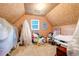 Unfinished bonus room with sloped ceilings and ample storage space at 10 Trail Hollow Dr, Charleston, SC 29414