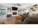 Living room with fireplace and access to patio at 10 Trail Hollow Dr, Charleston, SC 29414