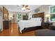 Spacious bedroom with hardwood floors and a king-size bed at 10 Trail Hollow Dr, Charleston, SC 29414