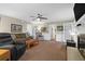 Spacious living room with fireplace and ceiling fan at 10 Trail Hollow Dr, Charleston, SC 29414