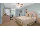 Bedroom with a queen bed, built-in desk and ceiling fan at 10 Trail Hollow Dr, Charleston, SC 29414