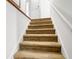 Beige carpeted stairs leading to the upper level at 10 Trail Hollow Dr, Charleston, SC 29414