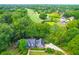 Brick house with gray roof and landscaped yard near golf course at 10 Trail Hollow Dr, Charleston, SC 29414