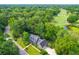 Brick house with gray roof and landscaped yard near golf course at 10 Trail Hollow Dr, Charleston, SC 29414
