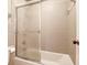 Bathroom with a shower/tub combo and glass sliding door at 10 Trail Hollow Dr, Charleston, SC 29414