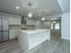 Modern kitchen with white cabinets, marble countertops, and stainless steel appliances at 133 Marion Rd, Summerville, SC 29486