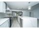 Modern kitchen with white cabinets and quartz countertops at 133 Marion Rd, Summerville, SC 29486