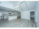 Modern kitchen with white cabinets, island, and stainless steel appliances at 133 Marion Rd, Summerville, SC 29486