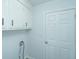 Laundry room with white cabinets and built-in shelving at 133 Marion Rd, Summerville, SC 29486