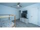 Bedroom with two TVs, a dresser, and ceiling fan at 133 Marion Rd, Summerville, SC 29486
