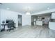 Open concept dining room with hardwood floors and kitchen view at 133 Marion Rd, Summerville, SC 29486