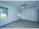 Well-lit bedroom featuring grey flooring and a closet at 133 Marion Rd, Summerville, SC 29486