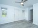 Bright living room featuring vinyl plank flooring and an exterior door at 133 Marion Rd, Summerville, SC 29486