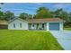 Charming ranch home with a freshly painted exterior and new garage door at 133 Marion Rd, Summerville, SC 29486