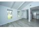Spacious living room with gray vinyl flooring and high ceilings at 133 Marion Rd, Summerville, SC 29486