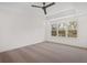 Spacious bedroom with neutral carpeting and a large window at 423 Grove End Rd, Moncks Corner, SC 29461