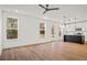Spacious living room with hardwood floors and access to deck at 423 Grove End Rd, Moncks Corner, SC 29461