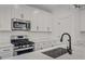 Stainless steel appliances and gas range in a modern kitchen setting at 423 Grove End Rd, Moncks Corner, SC 29461
