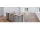 Kitchen island with granite countertop and stainless steel sink at 5536 Bowmore Blvd, Ravenel, SC 29470