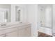 Modern bathroom with dual vanity and a shower/tub combo at 5536 Bowmore Blvd, Ravenel, SC 29470