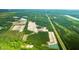 Aerial view of new home community development, showcasing the lots and surrounding natural landscape at 5536 Bowmore Blvd, Ravenel, SC 29470