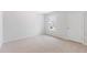 Bright bedroom featuring a window and neutral carpeting at 5536 Bowmore Blvd, Ravenel, SC 29470