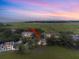 Aerial view of a beautiful community with marsh views at sunset at 1239 Creek Watch, Seabrook Island, SC 29455