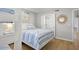 Bedroom with full-size bed, bunk beds, and ensuite bathroom access at 1239 Creek Watch, Seabrook Island, SC 29455