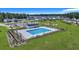 Community features a refreshing lap pool with lounge chairs at 516 Yellow Leaf Ln, Summerville, SC 29486