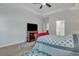 Relaxing bedroom featuring a cozy bed and media setup at 516 Yellow Leaf Ln, Summerville, SC 29486