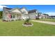 Houses with landscaping and a paved driveway at 516 Yellow Leaf Ln, Summerville, SC 29486