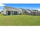 Spacious backyard with home and wooden fence at 516 Yellow Leaf Ln, Summerville, SC 29486