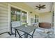Relaxing screened porch with hot tub and seating area at 516 Yellow Leaf Ln, Summerville, SC 29486