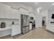 Modern kitchen with stainless steel appliances and white shaker cabinets at 516 Yellow Leaf Ln, Summerville, SC 29486