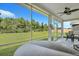 Screened porch overlooking backyard with seating area at 516 Yellow Leaf Ln, Summerville, SC 29486