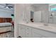 Modern bathroom with double sinks and a view of bedroom at 516 Yellow Leaf Ln, Summerville, SC 29486