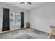 Bedroom with gray walls, wood-look floors, and gray area rug at 516 Yellow Leaf Ln, Summerville, SC 29486