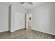 Bright bedroom with double door closet and wood-look floors at 516 Yellow Leaf Ln, Summerville, SC 29486